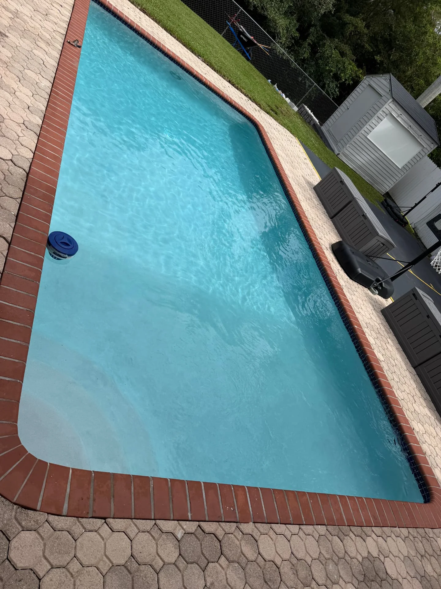 Finished bright blue pool after Diamond Brite resurfacing by Pool Vice