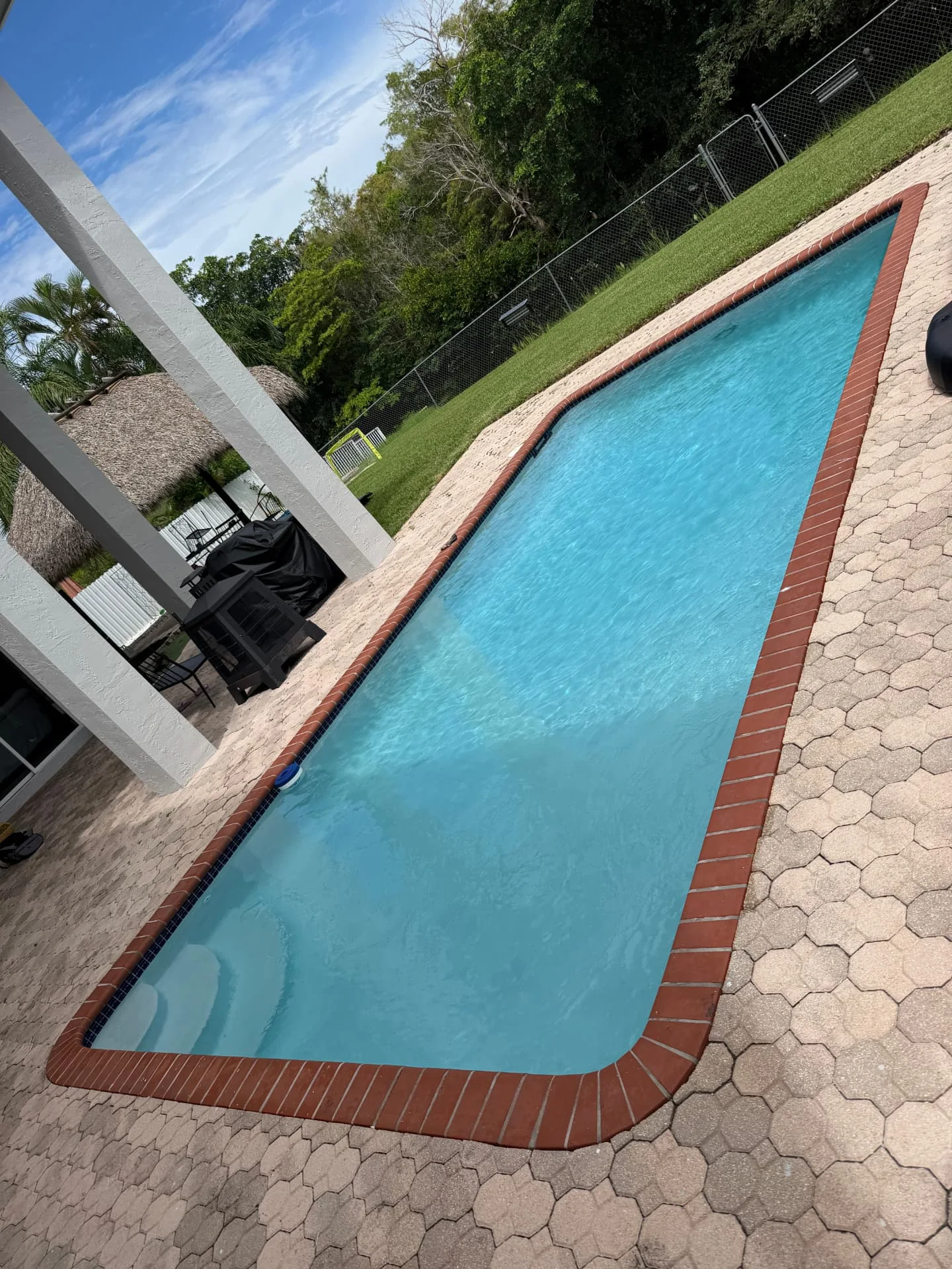 Clear blue pool with completed Diamond Brite finish in South Florida